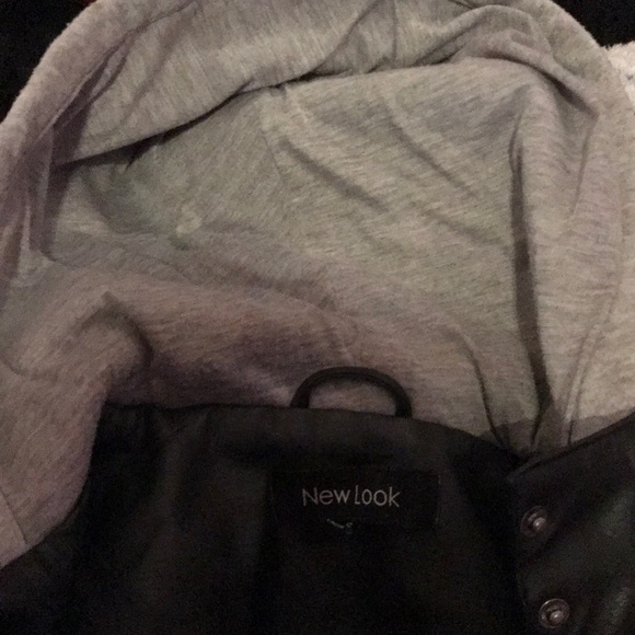 A leather jacket with gray cotton sleeves - Picture 2 of 5